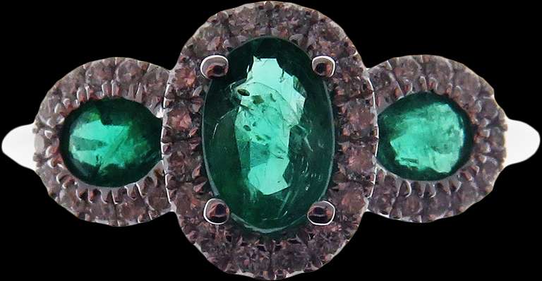 Beautiful Three-Stone Emerald 18k White Gold Ring edged with Sparkling Diamonds