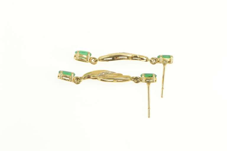 14K Yellow Gold Oval Emerald Diamond Accent Dangle Earrings