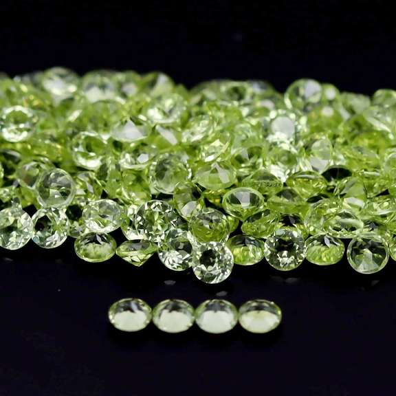 Dazzling 12.38ct untreated apple green Peridot set