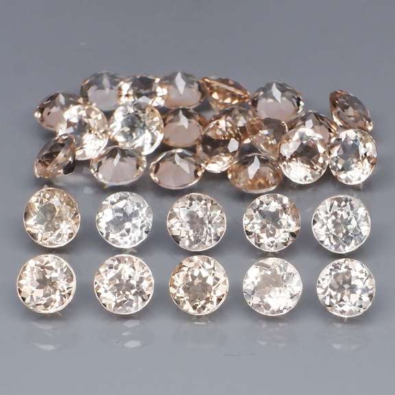 Superb quality 9.21ct 30pc imperial Topaz set