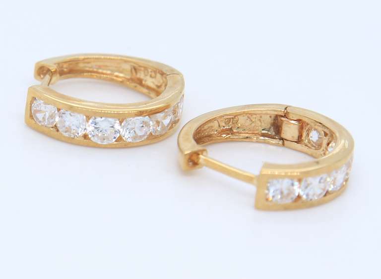 Charming Yellow Gold CZ Huggies Earrings