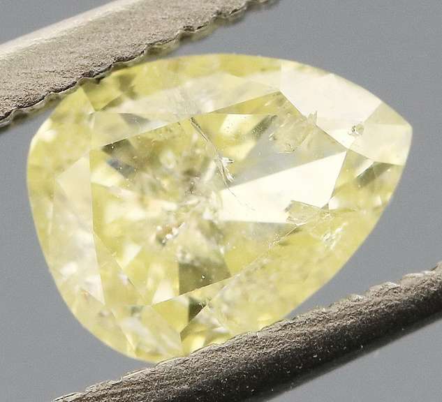 Pear cut .37ct canary yellow Diamond