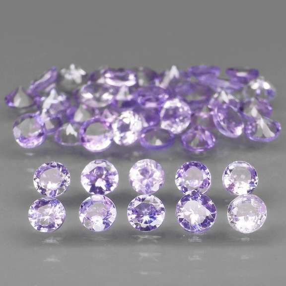 Heavy flashing 5.05ct diamond cut Tanzanite set