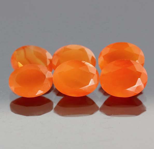Vivid orange 13.06ct untreated oval cut Carnelian set