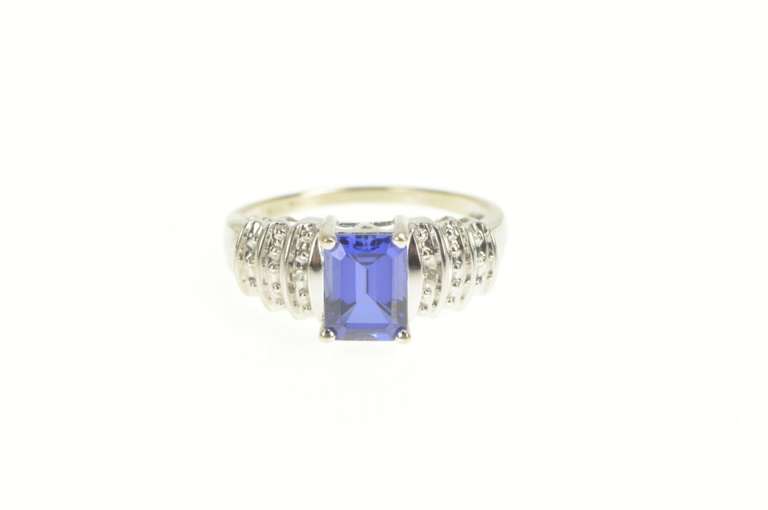10K White Gold Emerald Cut Syn. Sapphire Diamond Accent Ring