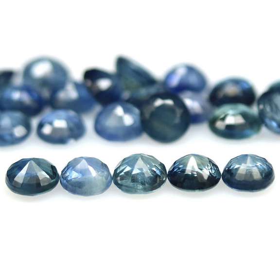 Multi-hue 6.94ct natural blue Sapphire set