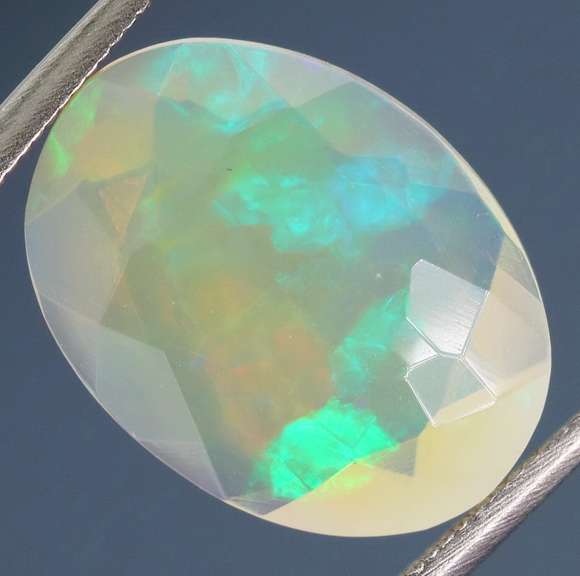 Floral glittering 2.46ct faceted Jelly Opal