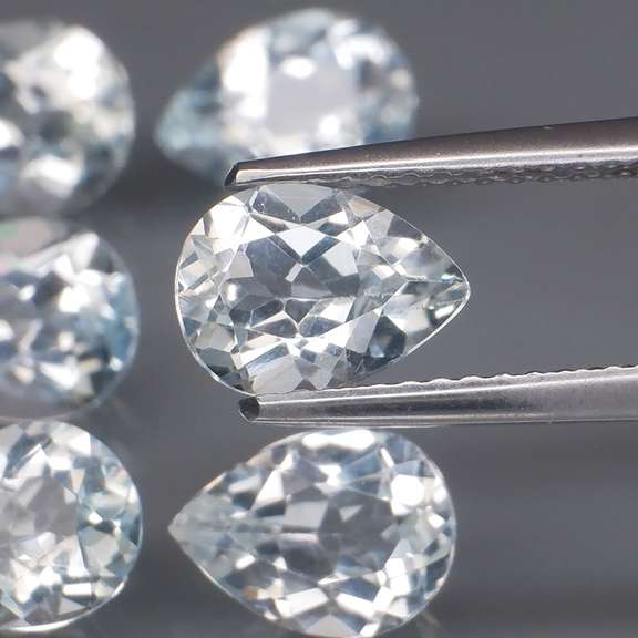 Glittering 7.75ct UNHEATED whisper blue Topaz set
