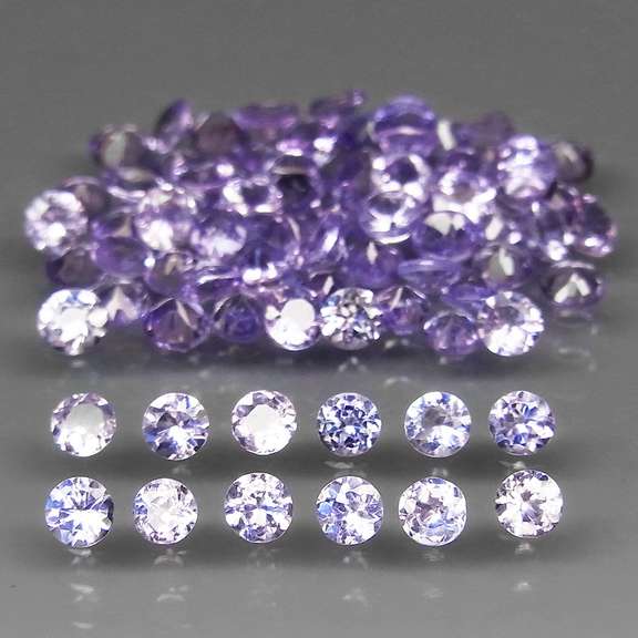 Glittering 5.42ct bright blue violet Tanzanite set