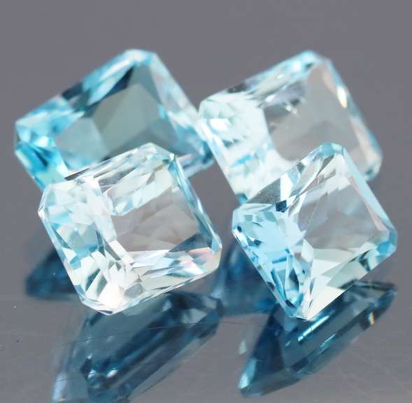 Matched! 4 piece 20.13ct full fire Swiss blue Topaz set