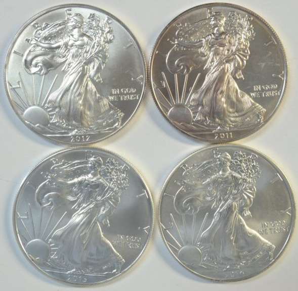 4 Superb Gem BU $1 Silver Eagles from 2011 to 2014