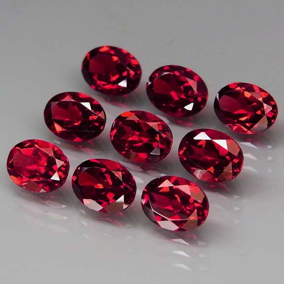 Premium 13.13ct oval cut cherry red Garnet set