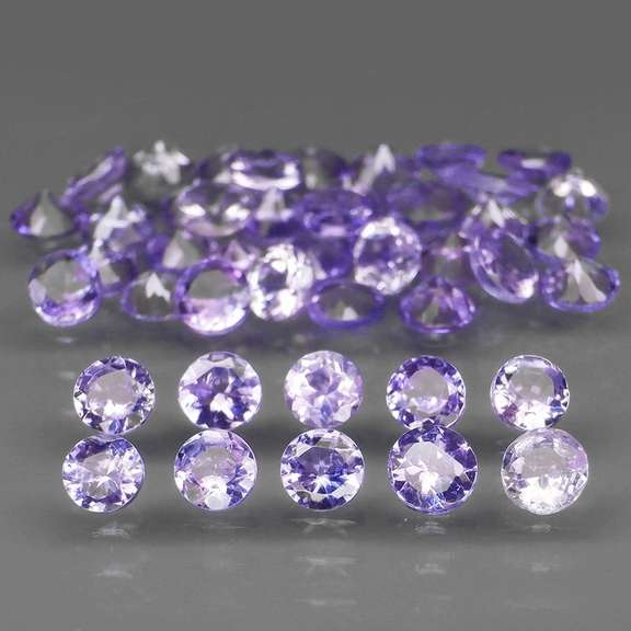 Glittering 4.91ct bright blue violet Tanzanite set