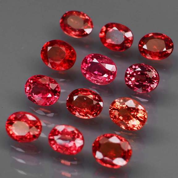 Brilliant 4.15ct fancy red orange Songean Sapphire set