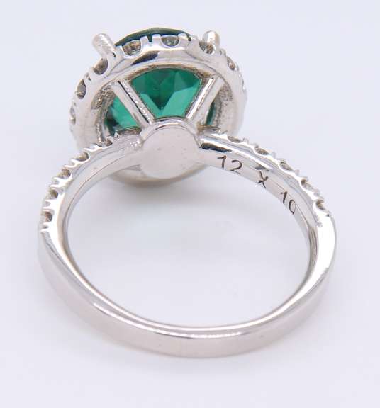 LADIES 14 KT GREEN TOURMALINE and DIAMOND RING.
