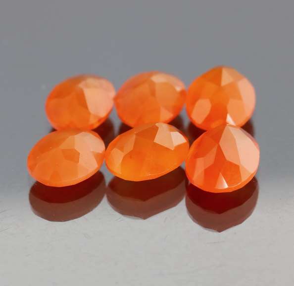 Vivid orange 13.06ct untreated oval cut Carnelian set