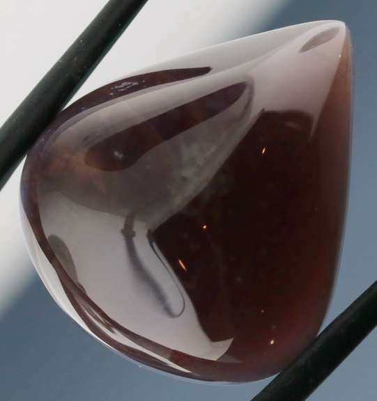 Glowing 29.50ct untreated Chalcedony cabochon