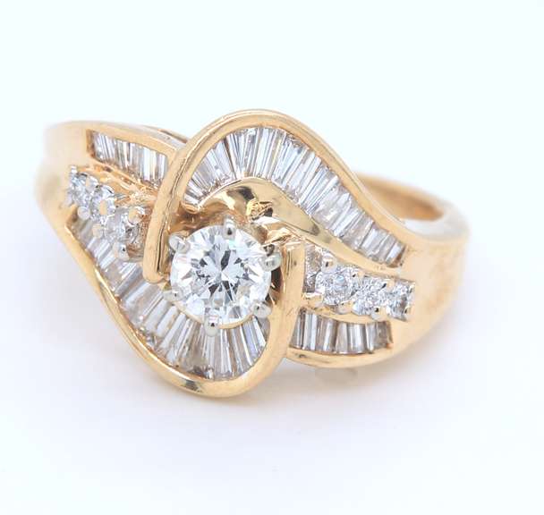 Sparkling Yellow Gold Round Brilliant Cut and Baguette Swirl Engagement Ring