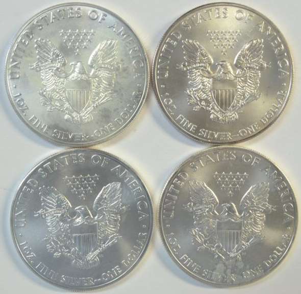4 Superb Gem BU $1 Silver Eagles from 2011 to 2014