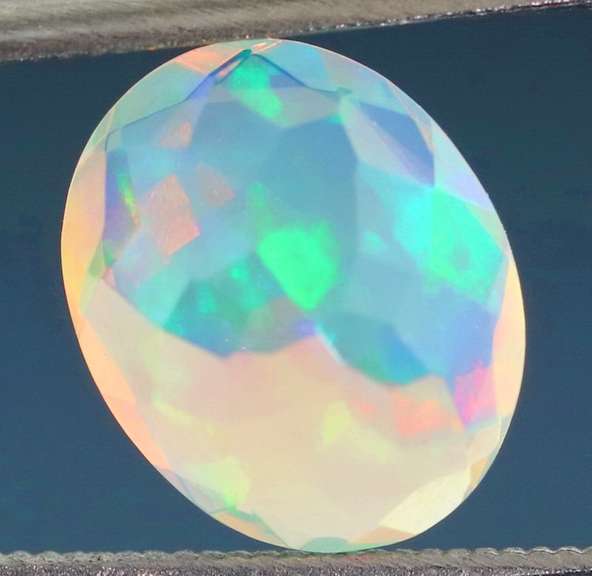 Excellent glittering 1.69ct faceted Jelly Opal