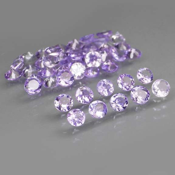 Heavy flashing 5.05ct diamond cut Tanzanite set