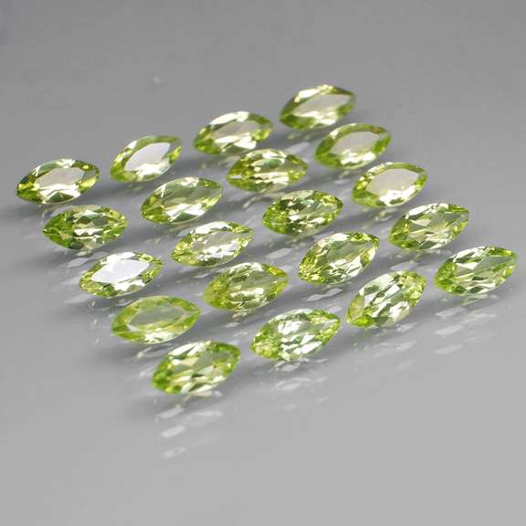 Dazzling 7.85ct untreated apple green Peridot set