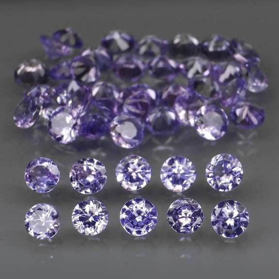 Glittering 5.22ct bright blue violet Tanzanite set