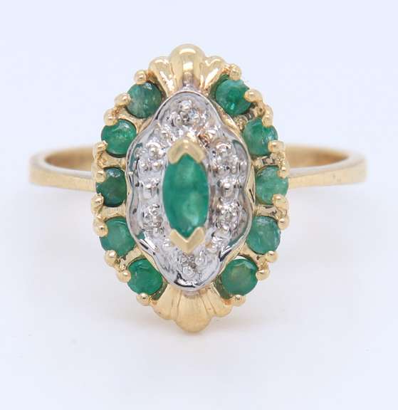 Festive Yellow Gold Emerald Ring