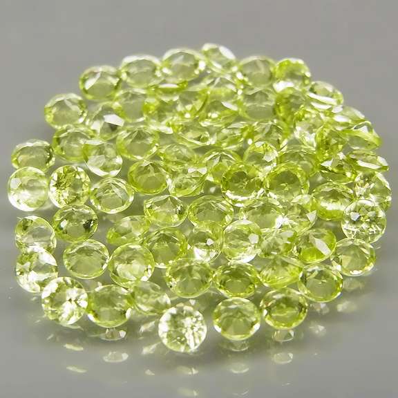 High grade 4.85ct untreated apple green Peridot set