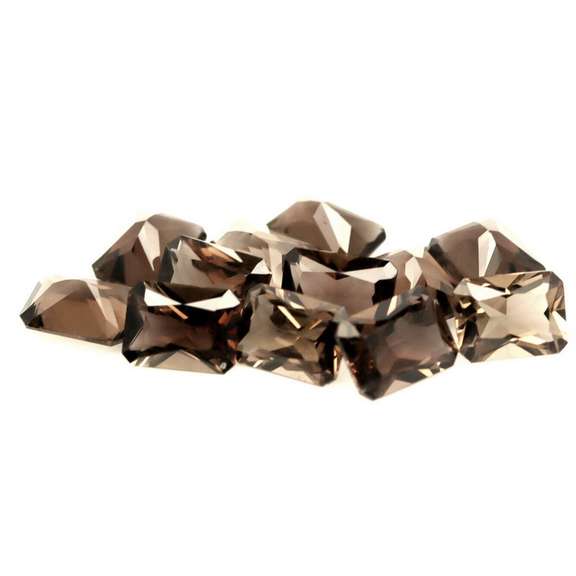 Emerald cut! Unheated! 15.67ct Smoky Quartz set