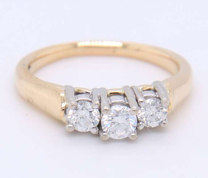 Brilliant Yellow Gold Three Stone Diamond Band