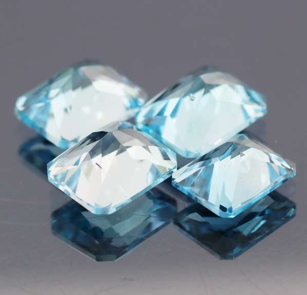Matched! 4 piece 20.13ct full fire Swiss blue Topaz set