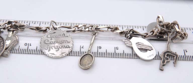 Vintage Sterling Silver Figaro Bracelet with Charms
