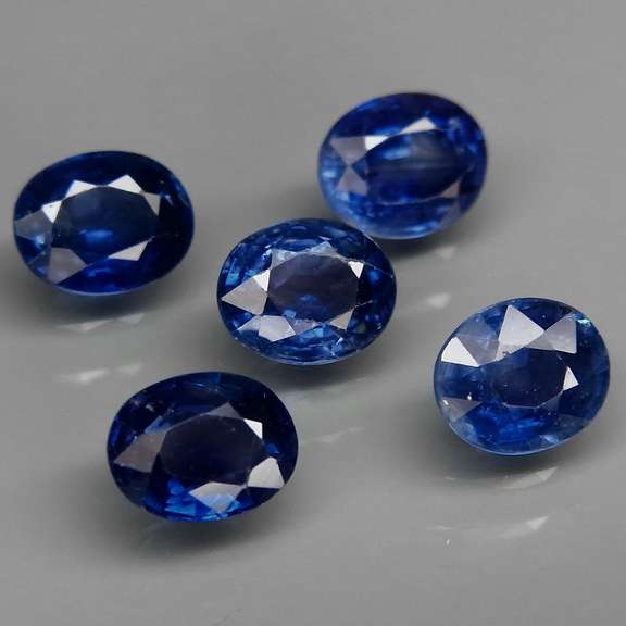 Heated Only! 2.28ct ink blue Sapphire set