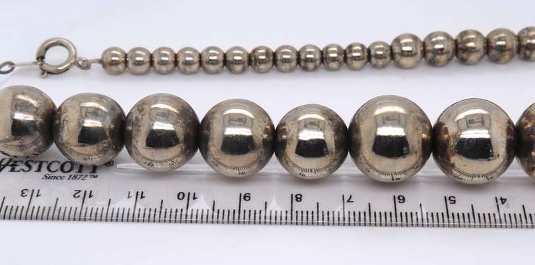 STERLING SILVER GRADUATED BEAD NECKLACE.