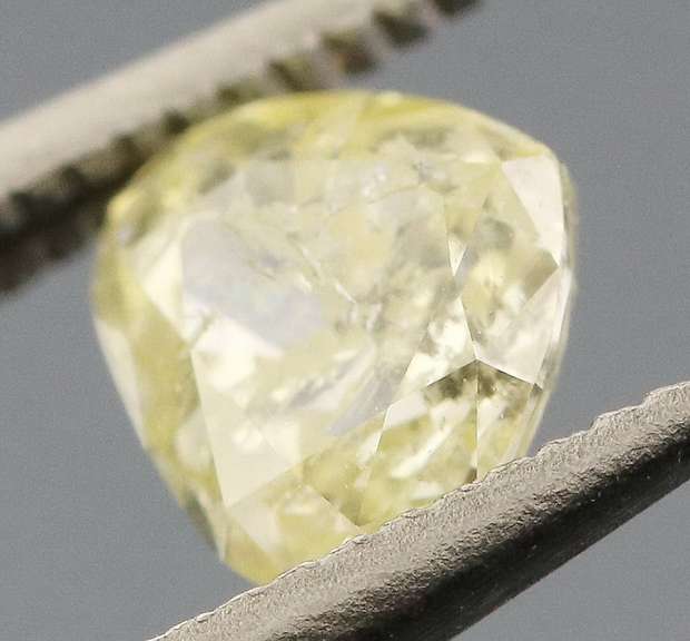 Gorgeous .41ct pear cut yellow Diamond