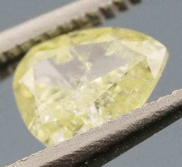 Pear cut .37ct canary yellow Diamond