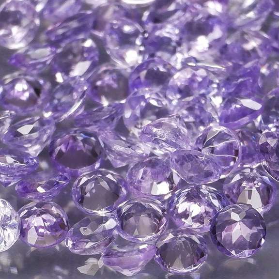 Heavy flashing 5.14ct diamond cut Tanzanite set