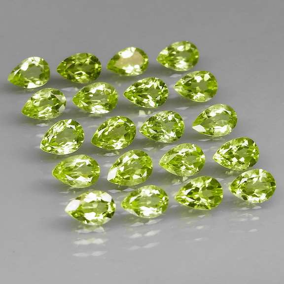 Fantastic 8.87ct 6x4mm pear cut Peridot set