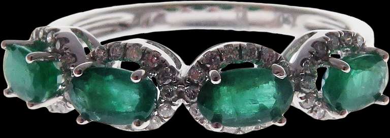 Mesmerizing Four-Stone Emerald 18k White Gold Ring edged with Diamonds