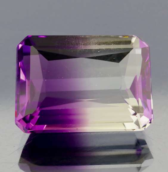 Beautiful 28.16ct top color created Ametrine