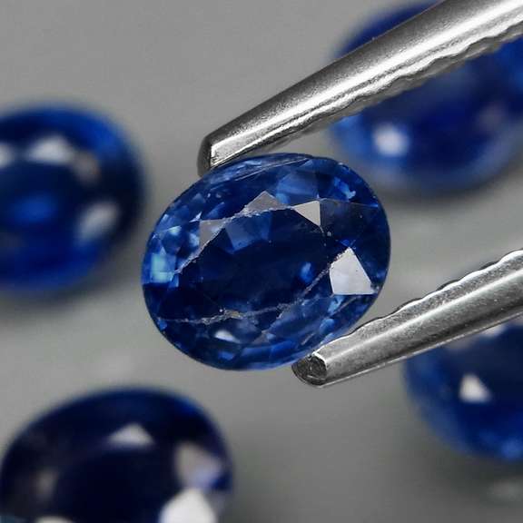 Heated Only! 2.28ct ink blue Sapphire set
