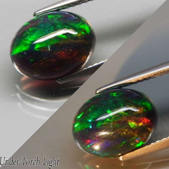 Magnificent 2.24ct full body flashing Black Opal