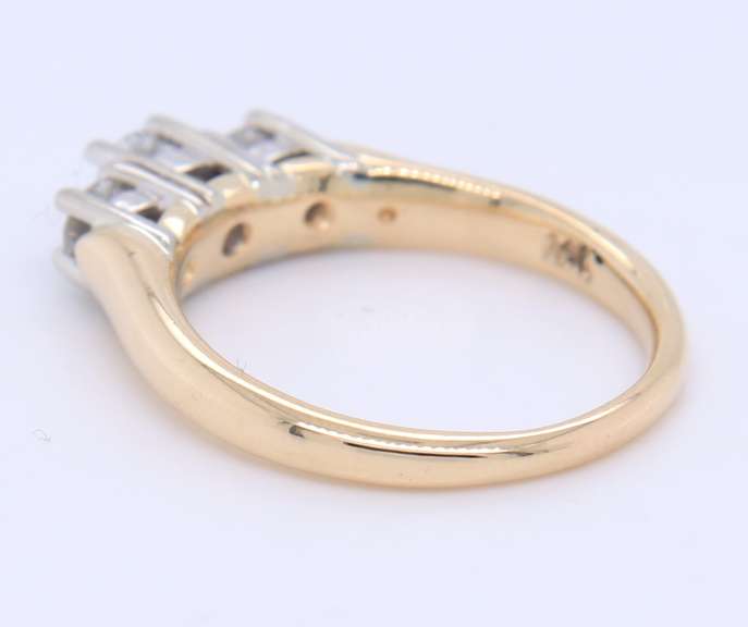Brilliant Yellow Gold Three Stone Diamond Band