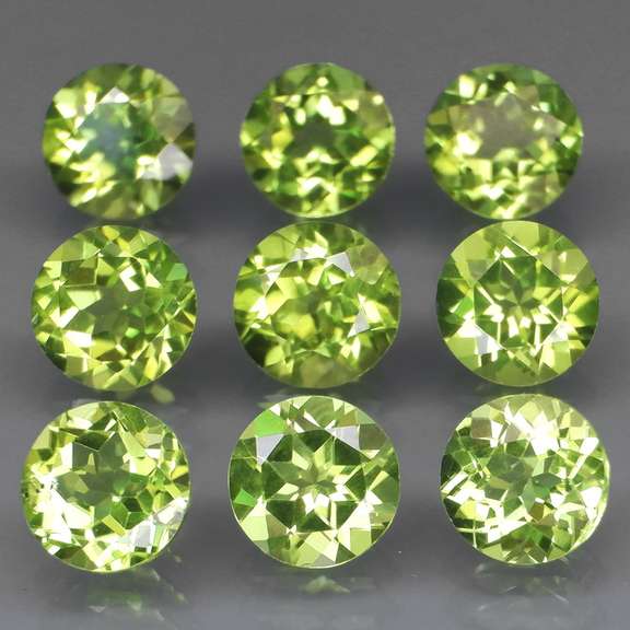 High grade 8.40ct untreated apple green Peridot set
