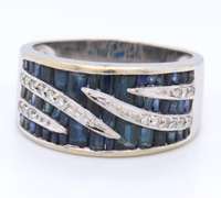 14KT WHITE GOLD BLUE SAPPHIRE & DIAMOND RING.