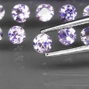 Glittering 5.30ct bright blue violet Tanzanite set