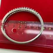 18KT WHITE GOLD DIAMOND BANGLE BRACELET.