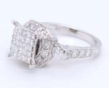 LADIES 14 KT WHITE GOLD DIAMOND RING.