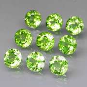 Excellent 8.26ct 6mm round cut Peridot set